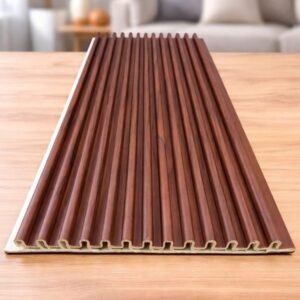 Brown wooden fluted wall panel with a modern grooved design displayed on a table