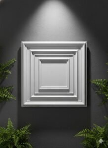 White 3D decorative wall panel with layered rectangular geometric borders mounted on a dark textured wall.