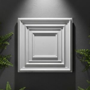 White 3D decorative wall panel with layered rectangular geometric borders mounted on a dark textured wall.