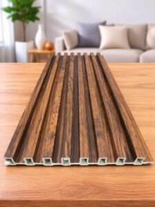 Brown wood-finish slatted wall panel displayed on a wooden table in a modern living room.