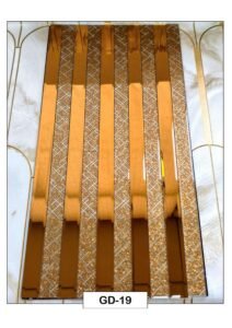golden decorative fluted wall panel with textured geometric strips