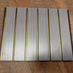 Grey wood-finish fluted panel with sleek golden vertical strips